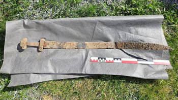 Ancient Viking sword discovered 'sticking up out of the ground' after 1,300 years