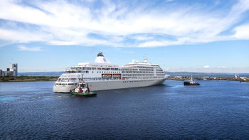 Cruise ship battles rough Pacific seas to save injured, stranded sailor