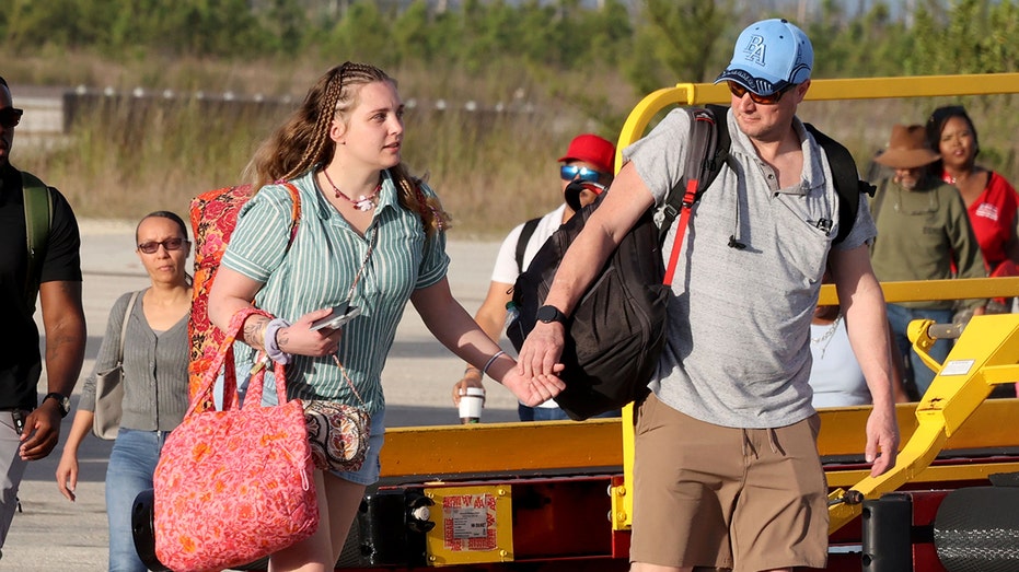 Daughter of missing American in Bahamas says Brian Hooker using mother's illness as 'excuse' to leave country
