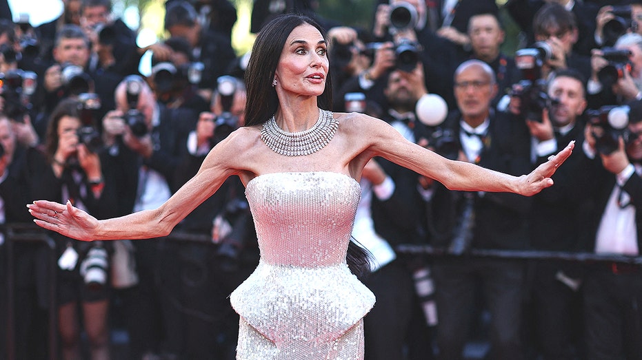 Demi Moore sparks 'fascist propaganda' backlash at Cannes after telling Hollywood to stop fighting AI