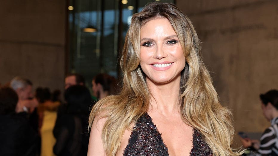 Heidi Klum stuns in black triangle bikini during relaxing poolside moment