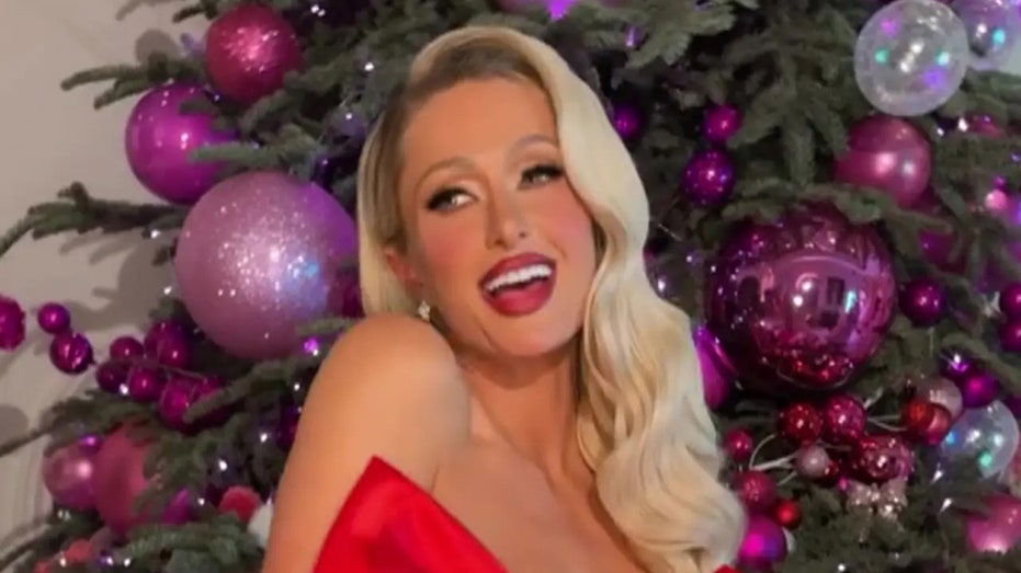 Paris Hilton strips down for racy Christmas photoshoot: 'My presence is a present'