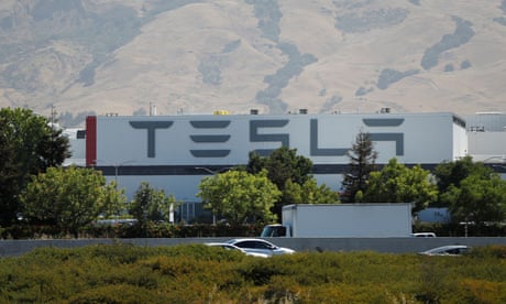 Tesla fires more than 30 workers after union drive announcement